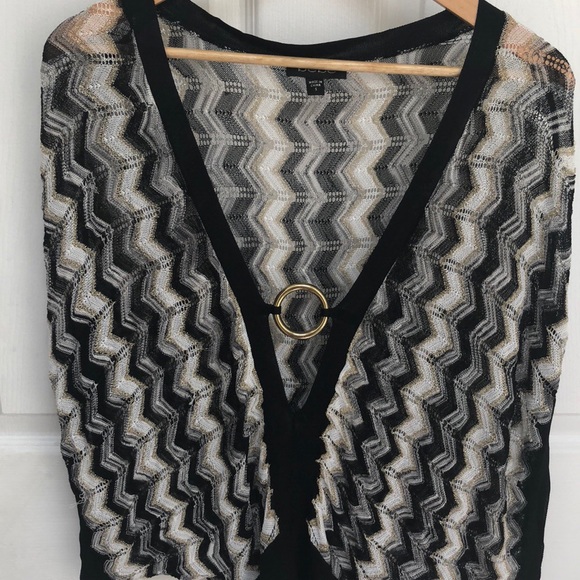 Knitted black Bebe top with round gold buckle - Picture 1 of 3